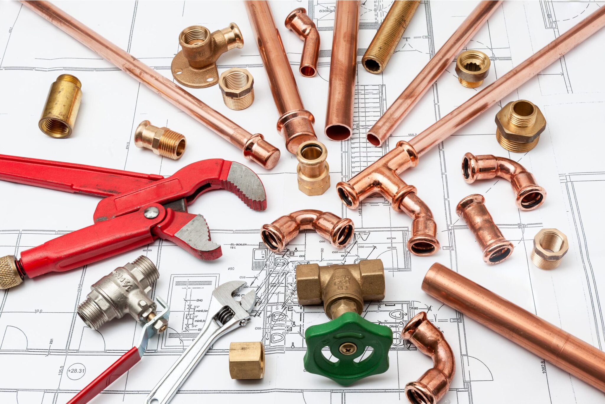 Copper pipes, fittings, valves, and plumbing tools in Thornton